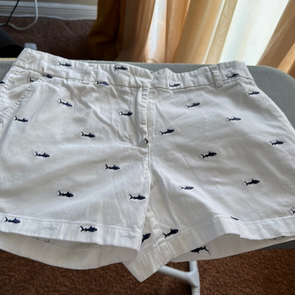 Like new woman white shorts with little Sharky